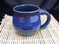50% HC$ Purple and Turquoise mug for a quiet naptime reading break